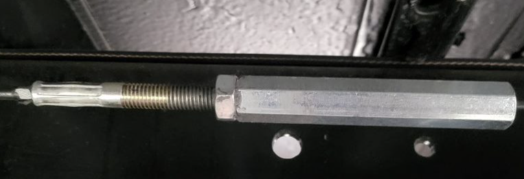 Figure 2 – Parking brake cable adjustment barrel.