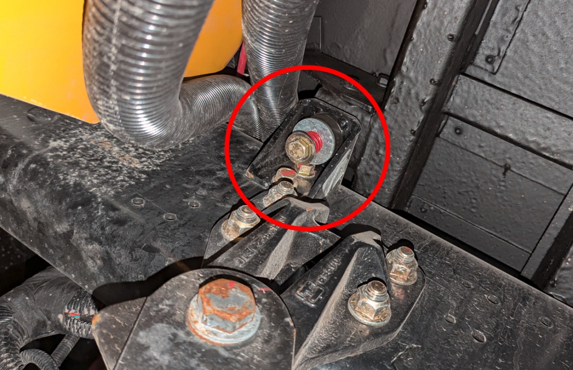 Figure 4 – Support avant avec ressort de tension.